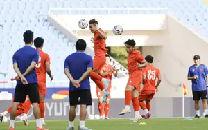 Who will Coach Kim Sang Sik assign to mark Mitchell Baker?