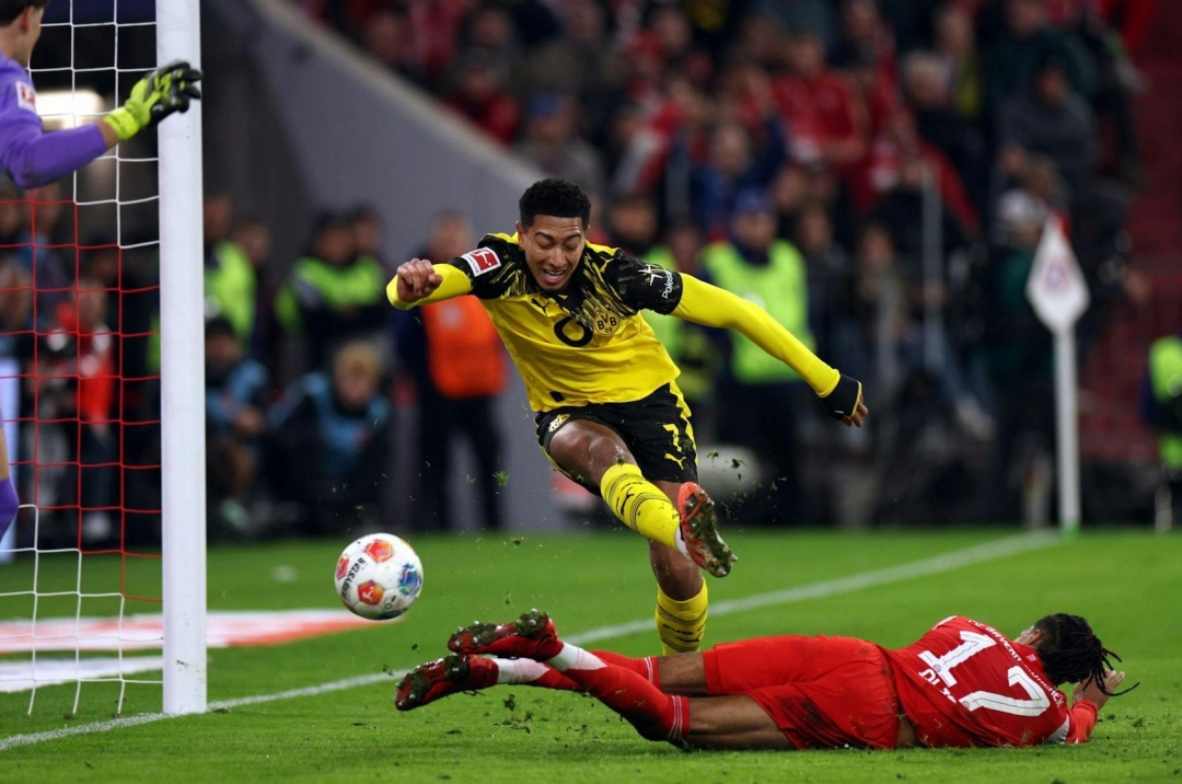 Dortmund's coach speaks out in defense of Bellingham after a critical mistake