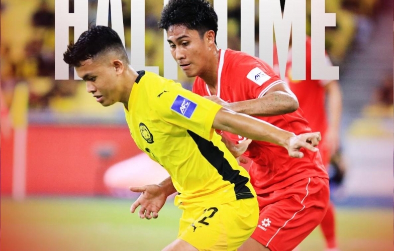 Malaysian fans react as their team thrashes Laos 5-1