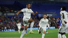 Mbappe scored in his 11th consecutive match, Real secured victory in a game featuring two red cards to reclaim the top spot from Barca.