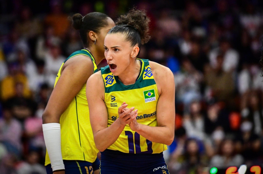 The captain of Brazil's women's volleyball team is dating... a fiery female MC