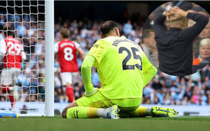 Guardiola holds his head in frustration due to Donnarumma's serious mistake.