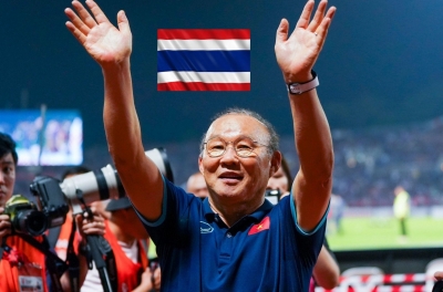Southeast Asian fans react in unison as Coach Park Hang Seo leads a Thai club