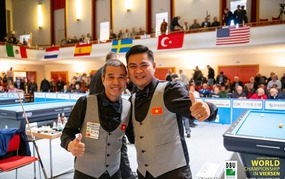 Two outstanding Vietnamese cueists overcome the German team to claim the world championship title.