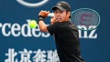 A 19-year-old Vietnamese-American tennis player surpasses a top 10 world star, achieving an unprecedented milestone in his career.