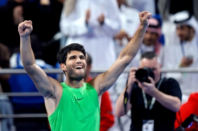 Alcaraz holding the trophy while winning the Qatar Open 2026