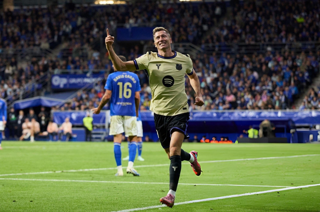 Comeback win over Oviedo, Barcelona keeps chasing Real