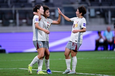 China's defending champion wins easily in Asian Cup opener