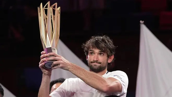 A tennis player ranked outside the Top 200 in the world wins the Shanghai Masters after defeating his cousin in the final.