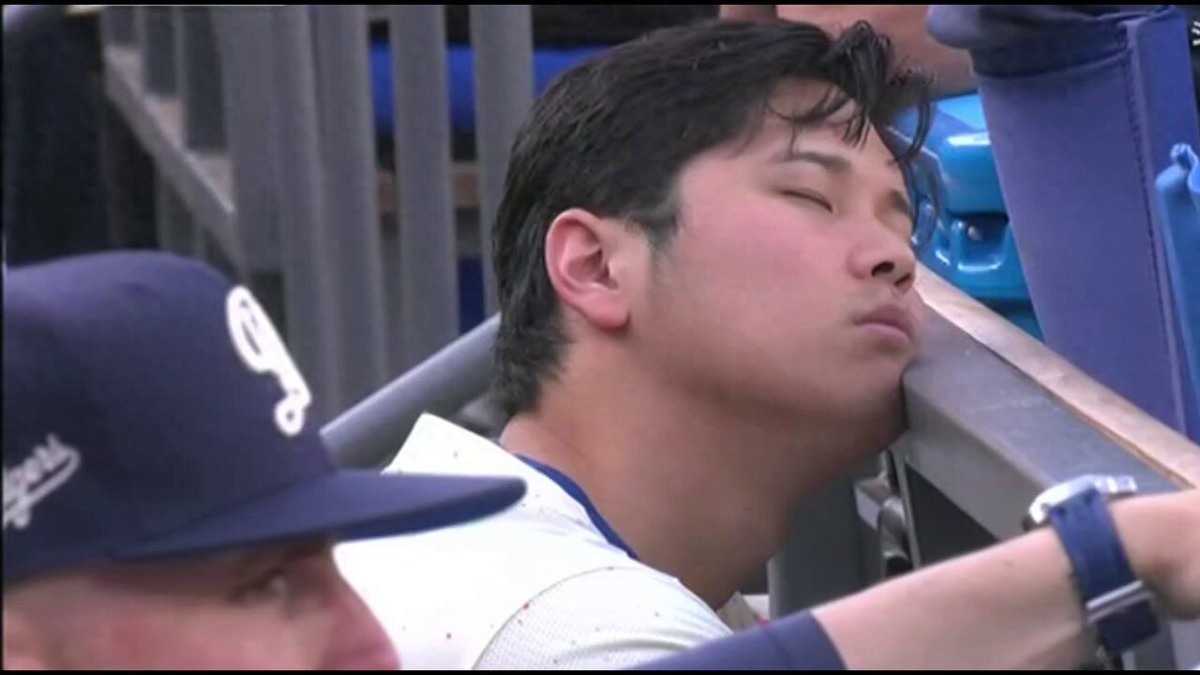 MLB superstar Shohei Ohtani was caught dozing off on the sidelines, causing heated discussions