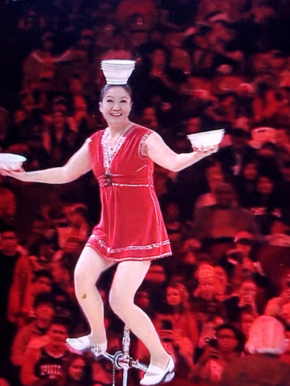 The bowl-balancing grandma officially returns! She appeared at the Bulls' home game wearing Jordan's number 45 jersey to announce her comeback.