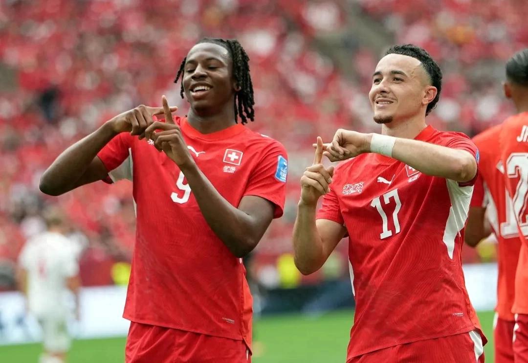 Two decades later, the "internationalized" Swiss team tops its group again.