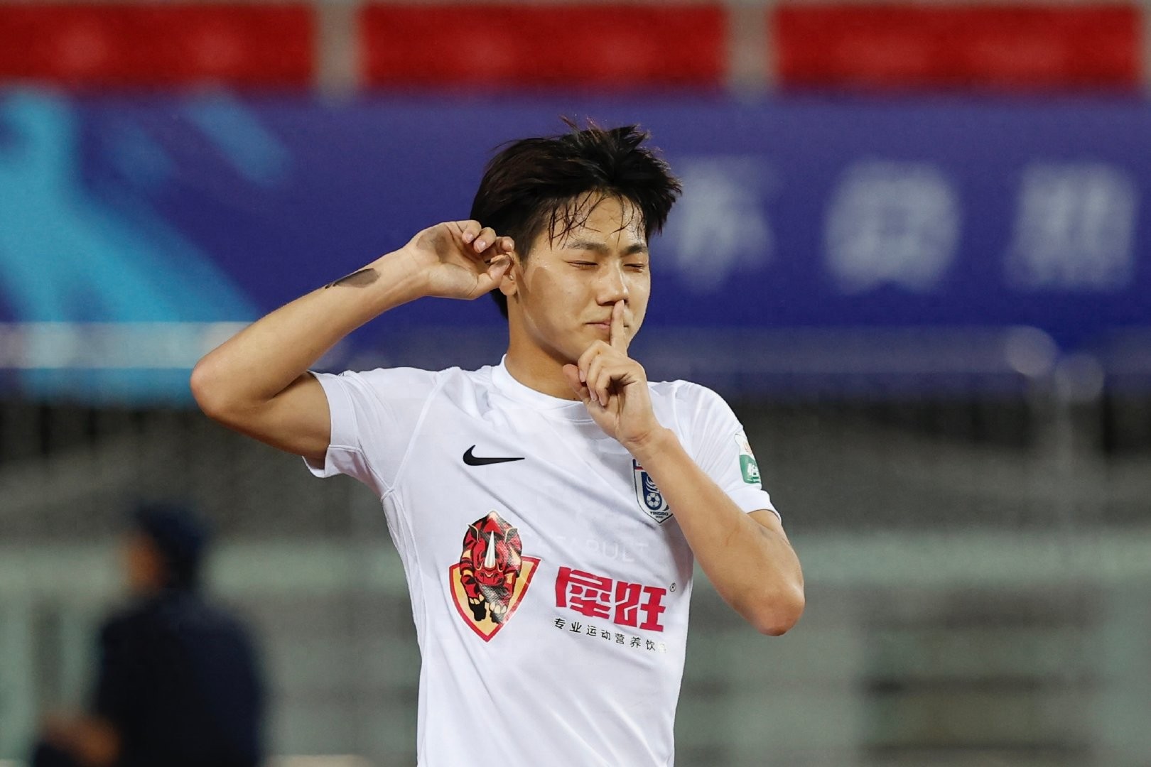 Dalian InBev continued its winless run away from home, leading by two goals and being held to a controversial penalty draw