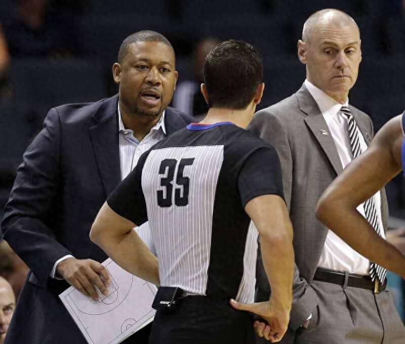 The NBA Mavericks' assistant coach was arrested for shooting and beating someone, and NBA officials have not yet commented on this