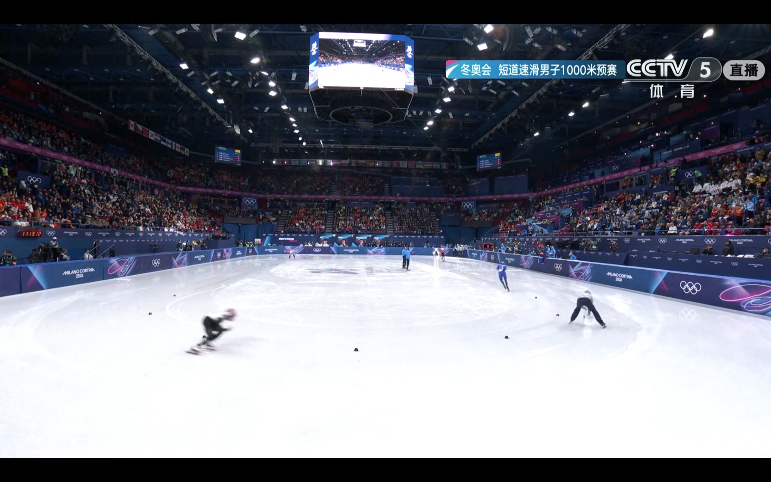 Live coverage of the Milan Winter Olympics short track speed skating men's 1000m heats featuring Liu Shaoang, Lim Hyojun, and Sun Long.