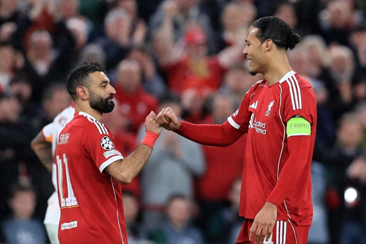 Slot's tactical enlightenment leads Liverpool's whirlwind attack, a 4-0 home victory secures a 4-1 aggregate comeback into the Champions League quarter-finals.