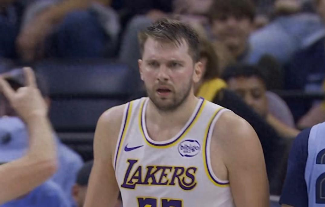 Luka Doncic returned with a stunning performance of 44 points, 12 rebounds, and 6 assists, while Morant struggled, making only 3 of 14 shots; Lakers defeated the Grizzlies in the NBA Cup game.