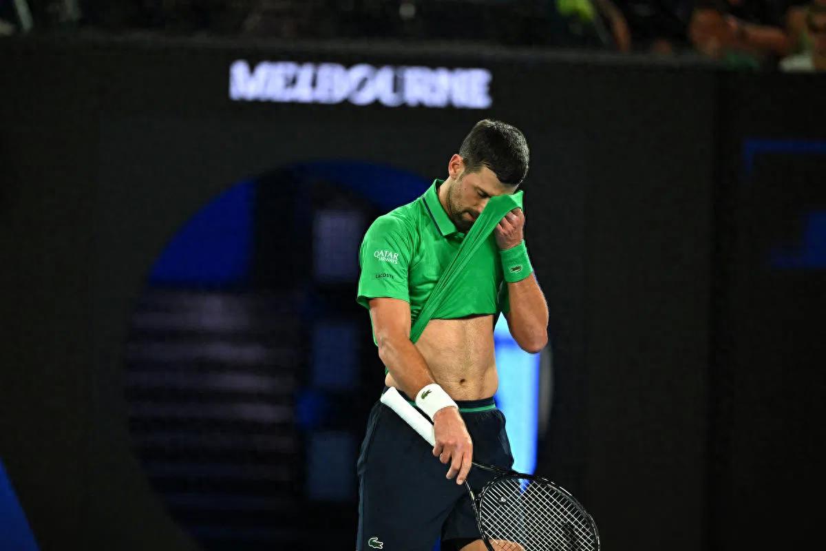Djokovic lost his temper and nearly hit a ball boy; the referee showed leniency to avoid another disqualification.