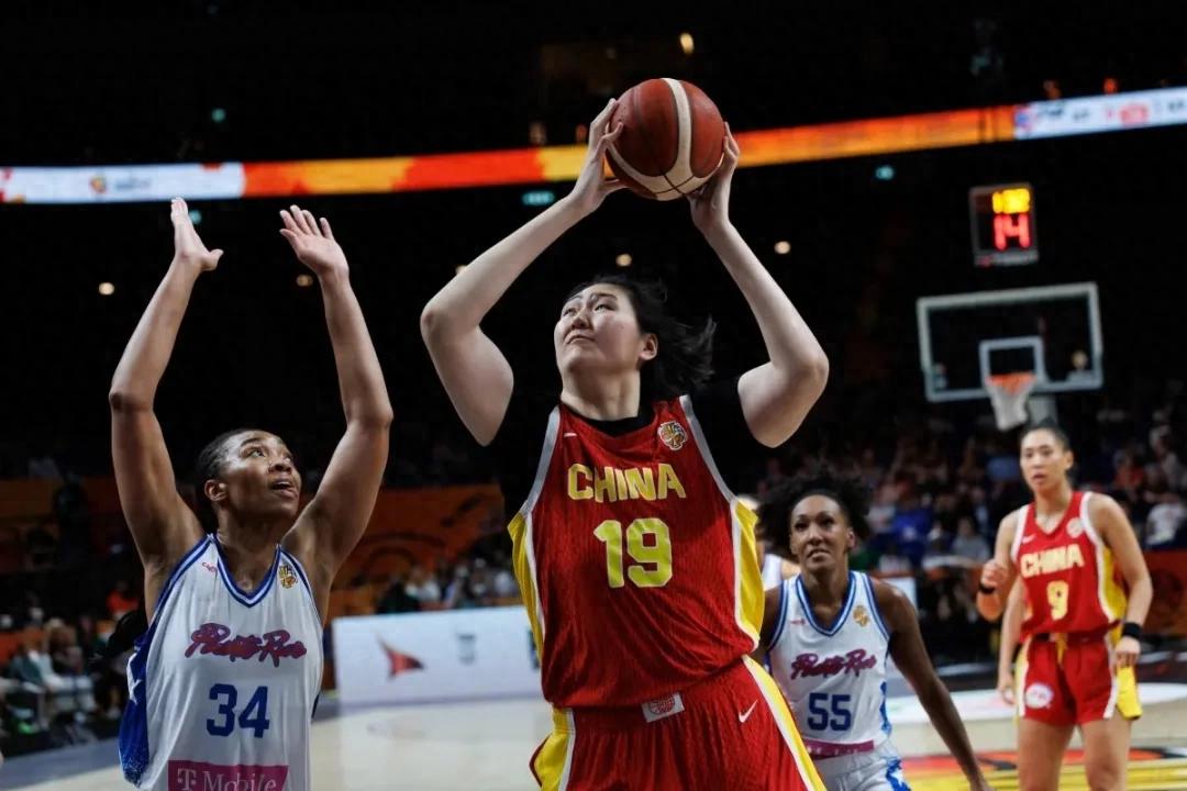 How would you rate Zhang Ziyu's performance in her first world championship?
