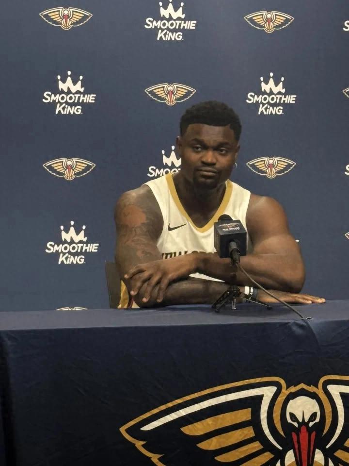 After a summer apart, Fat Tiger has slimmed down to Randall's size.