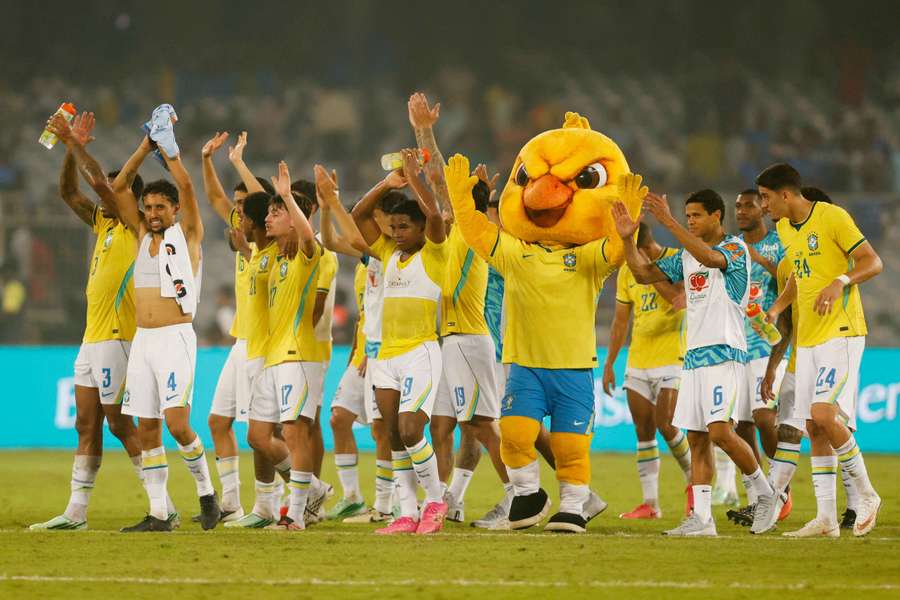 Brazil applaud the fans in India after their 4-0 win