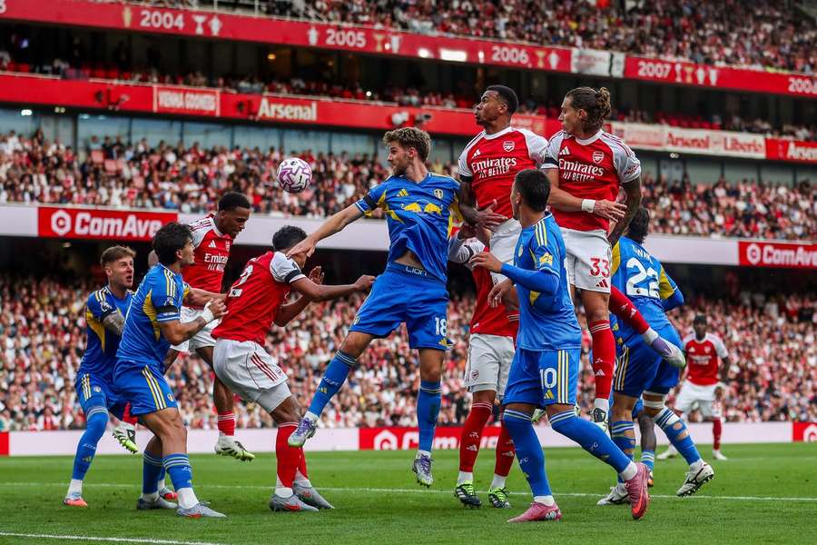 Leeds' Anton Stach is crowded out during the Premier League match vs Arsenal