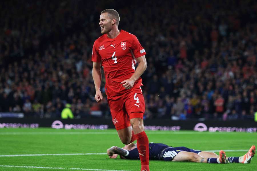 Nico Elvedi celebrates after scoring Switzerland's second goal Nico Elvedi celebrates after scoring Switzerland's second goal