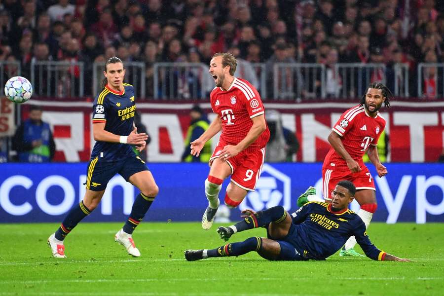Arsenal's Ezri Konsa fouls England colleague and Bayern Munich ace Harry Kane