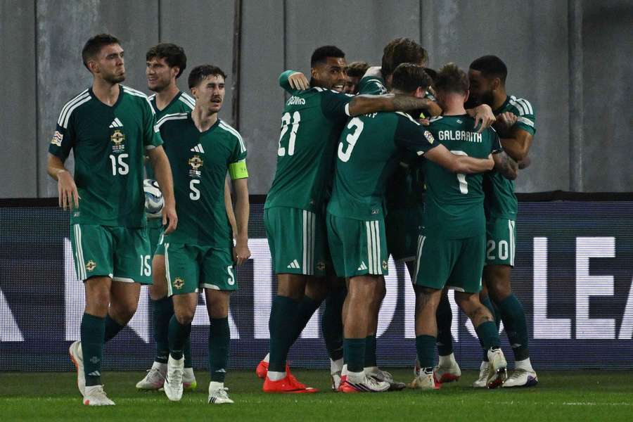 Northern Ireland's Shea Charles celebrates scoring with teammates