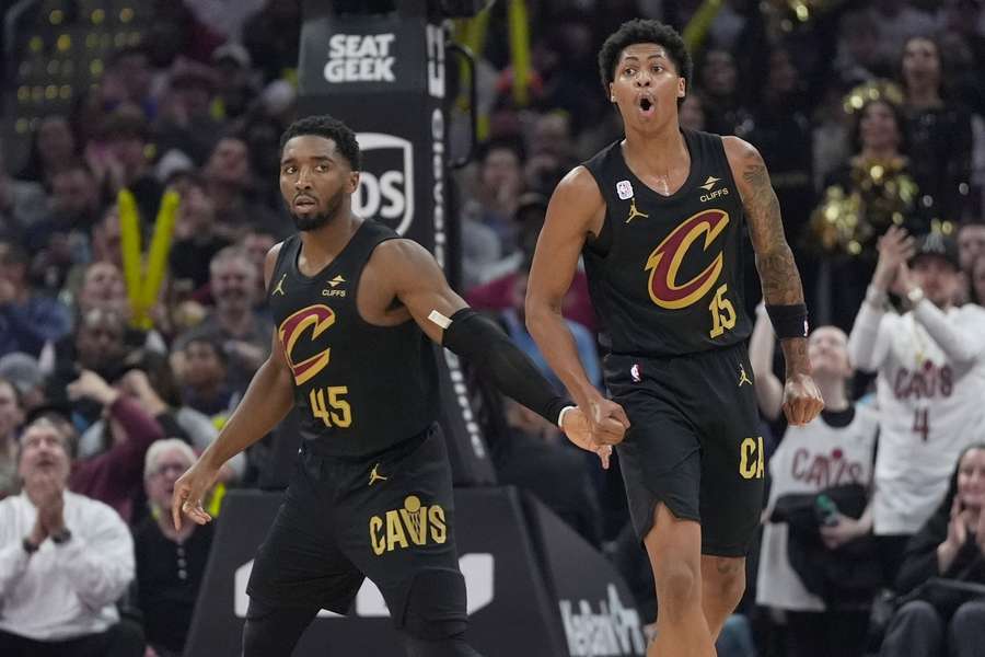 Meleek Thomas (R) celebrates alongside Donovan Mitchell