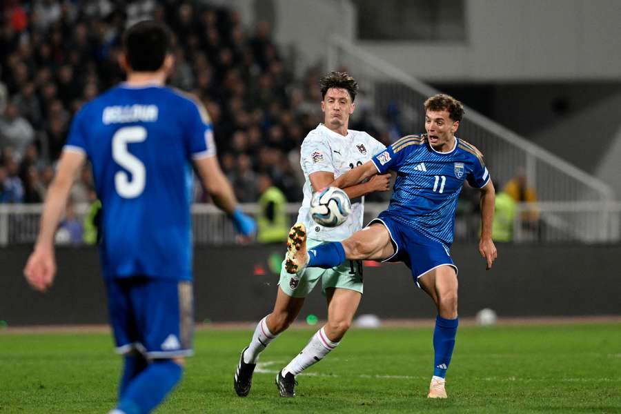 Kosovo and Austria battle for possession