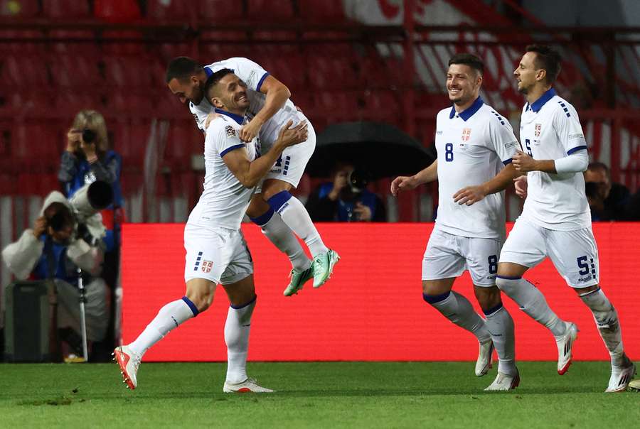 Serbia celebrate their opening goal Serbia celebrate their opening goal