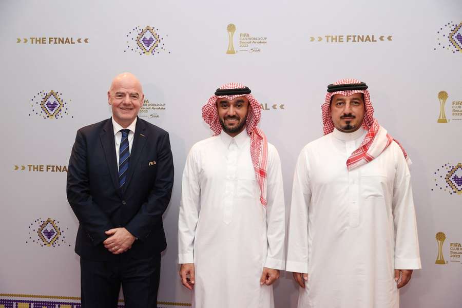 Gianni Infantino (L) with UAFA President Abdulaziz bin Turki al-Faisal (centre) in December 2023