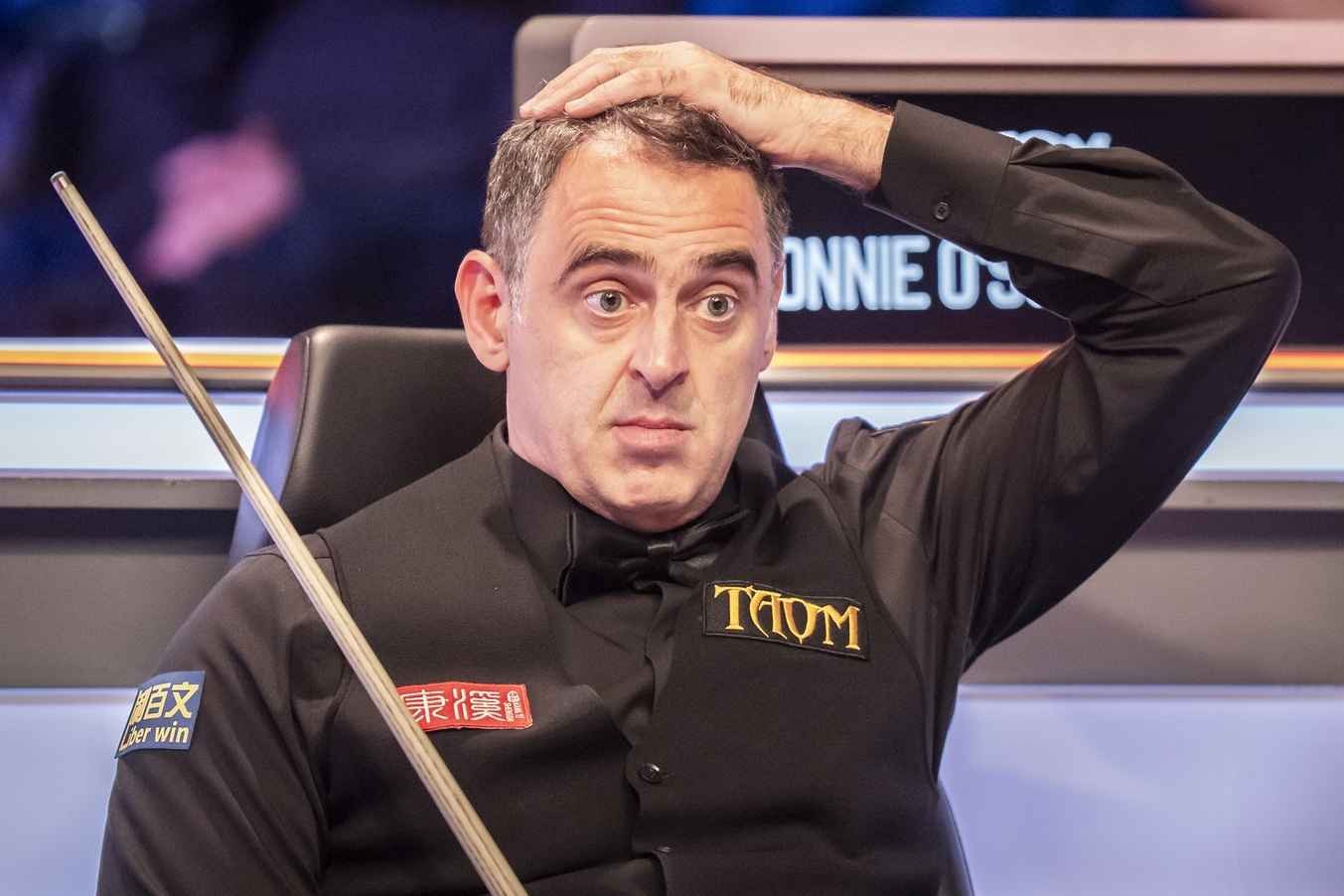 Ronnie O&#39;Sullivan was eliminated from the UK Championship in the first round by Zhou Yuelong.