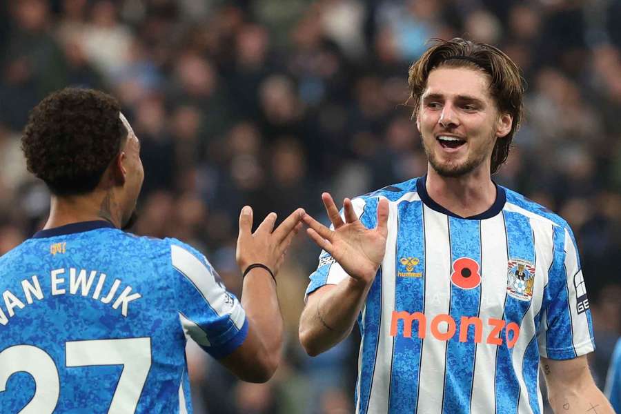 Coventry City's Jack Rudoni celebrates scoring their third goal with Milan van Ewijk Coventry City's Jack Rudoni celebrates scoring their third goal with Milan van Ewijk