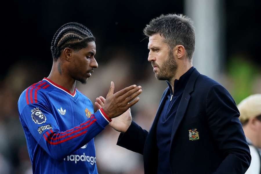Michael Carrick speaks to Marcus Rashford after the game vs Fulham Michael Carrick speaks to Marcus Rashford after the game vs Fulham