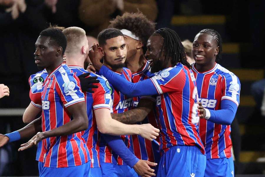 Crystal Palace's Maxence Lacroix celebrates scoring their first goal with teammates