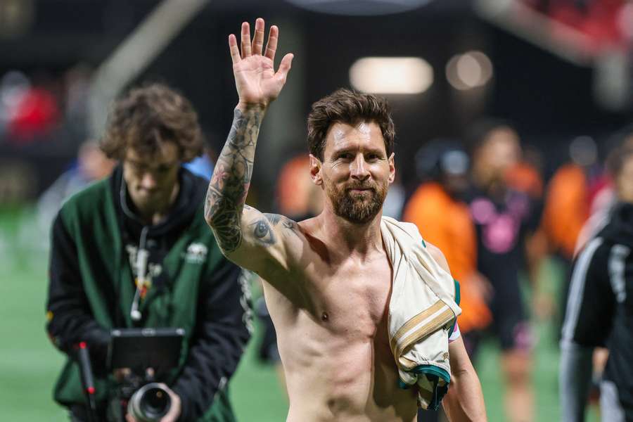 Messi celebrates his two goals Messi celebrates his two goals
