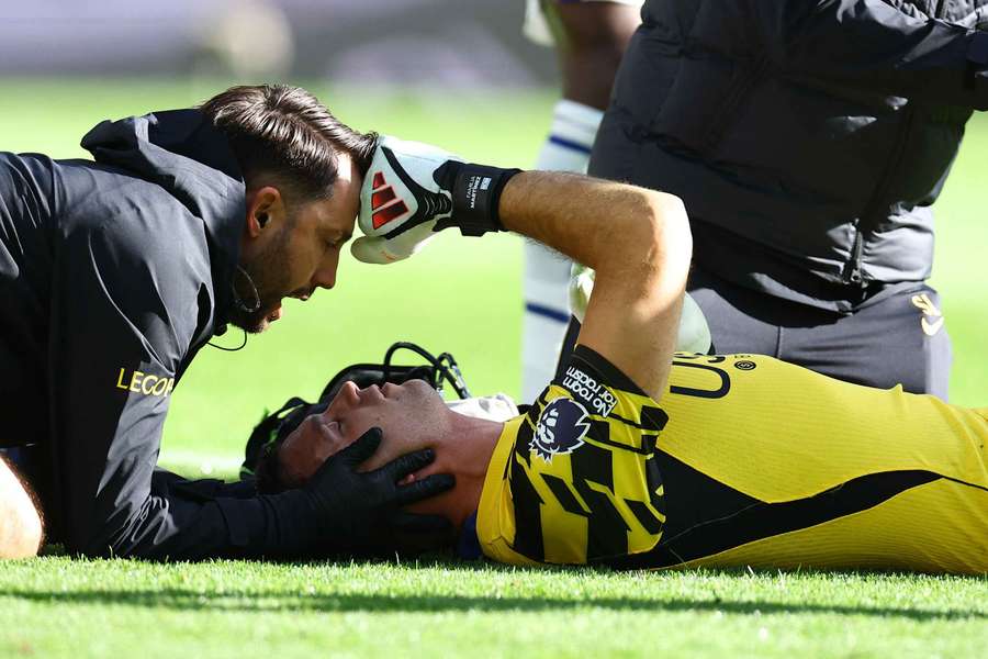 Emi Martinez was stretchered off against Everton