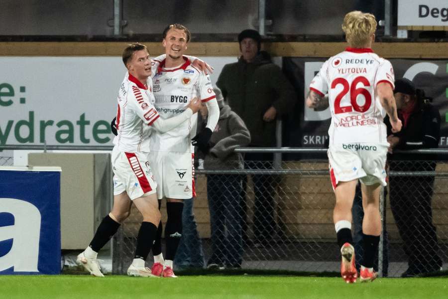 Kalmar players celebrate Vilmer Tyren's (centre) goal