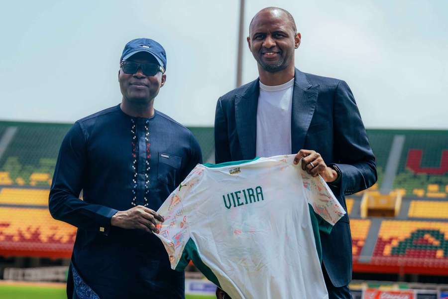 Senegal coach Patrick Vieira (right) being unveiled