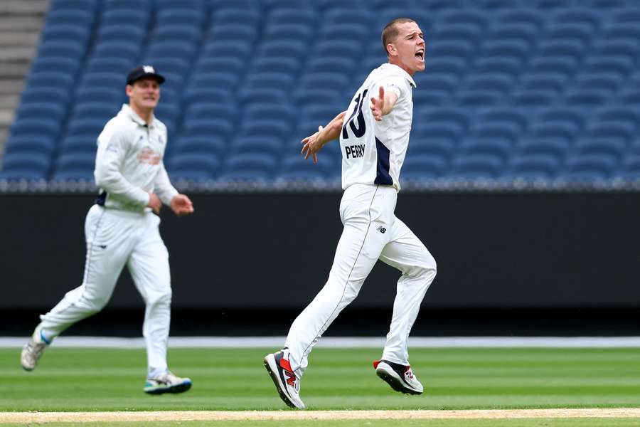 Mitch Perry celebrates the wicket of Mitch Marsh at the MCG on Thursday morning. Mitch Perry celebrates the wicket of Mitch Marsh at the MCG on Thursday morning.