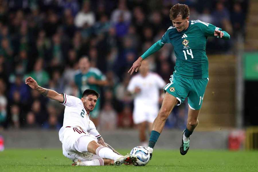 Hungary's Attila Osvath (left) and Northern Ireland's Isaac Price battle for the ball