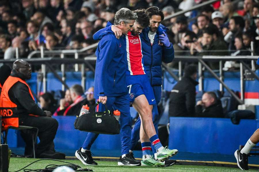 Kvaratskhelia had to be helped off the pitch against Barcelona