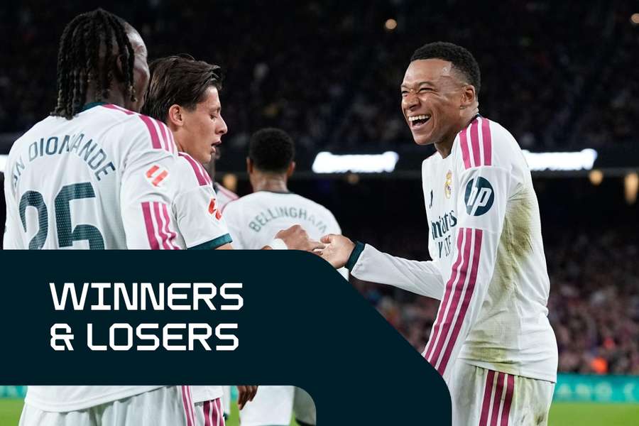 Mbappe (R) celebrates with Real Madrid teammates