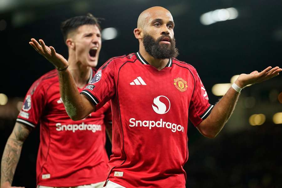 Manchester United's Bryan Mbeumo celebrates with Benjamin Sesko