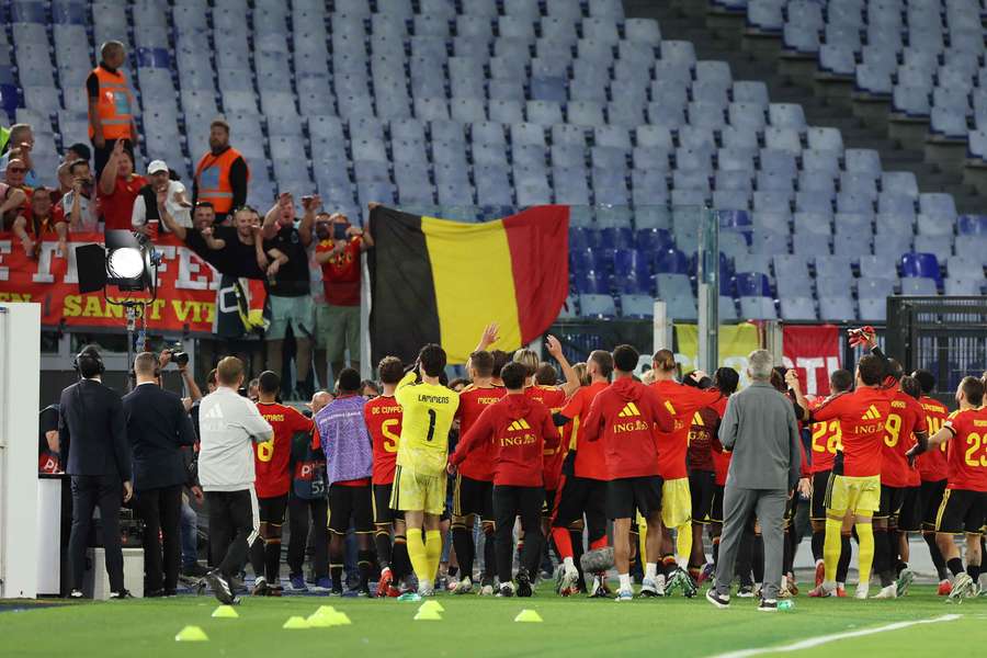 Belgian players go over to greet their fans at the Olimpico