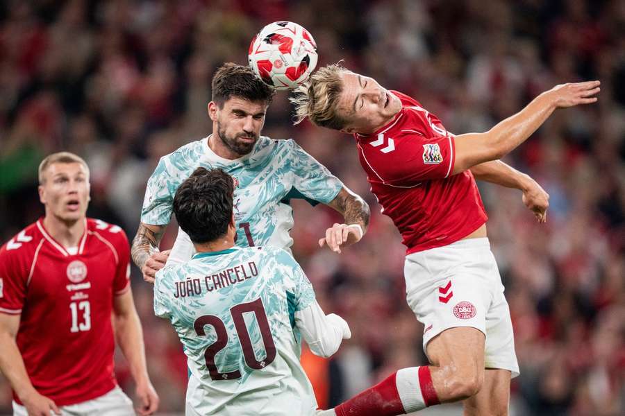 Portugal's Ruben Neves and Denmark's Rasmus Hojlund battle for the ball during the Nations League clash Portugal's Ruben Neves and Denmark's Rasmus Hojlund battle for the ball during the Nations League clash