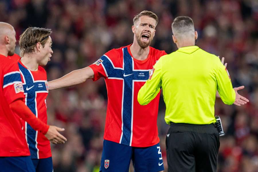 Kristoffer Ajer argues with referee Francois Letexier during the Portugal-clash Kristoffer Ajer argues with referee Francois Letexier during the Portugal-clash