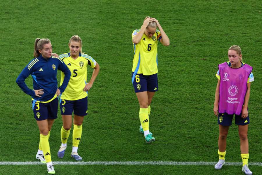 Sweden players looking dejected after losing on penalties